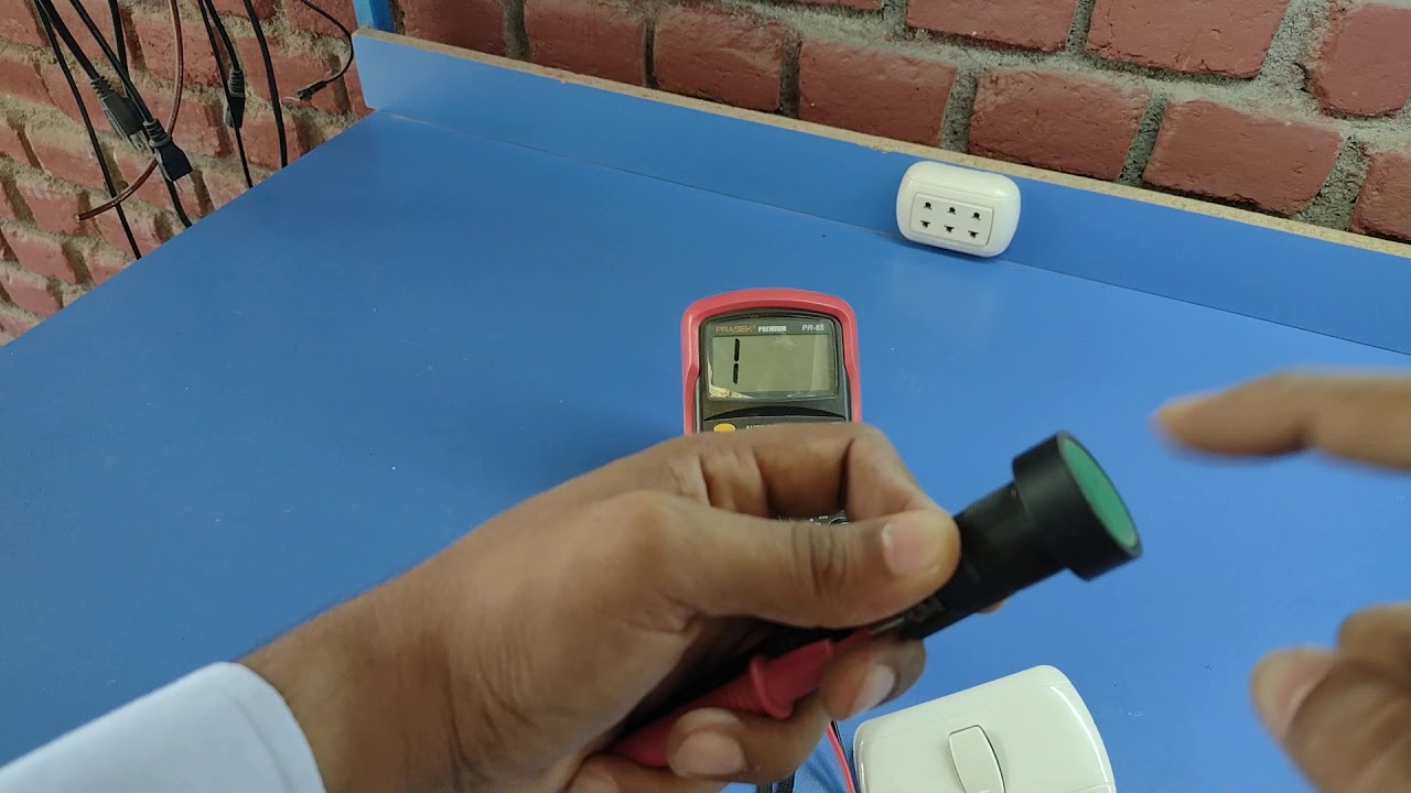 diferencia entre un interruptor y un pulsador